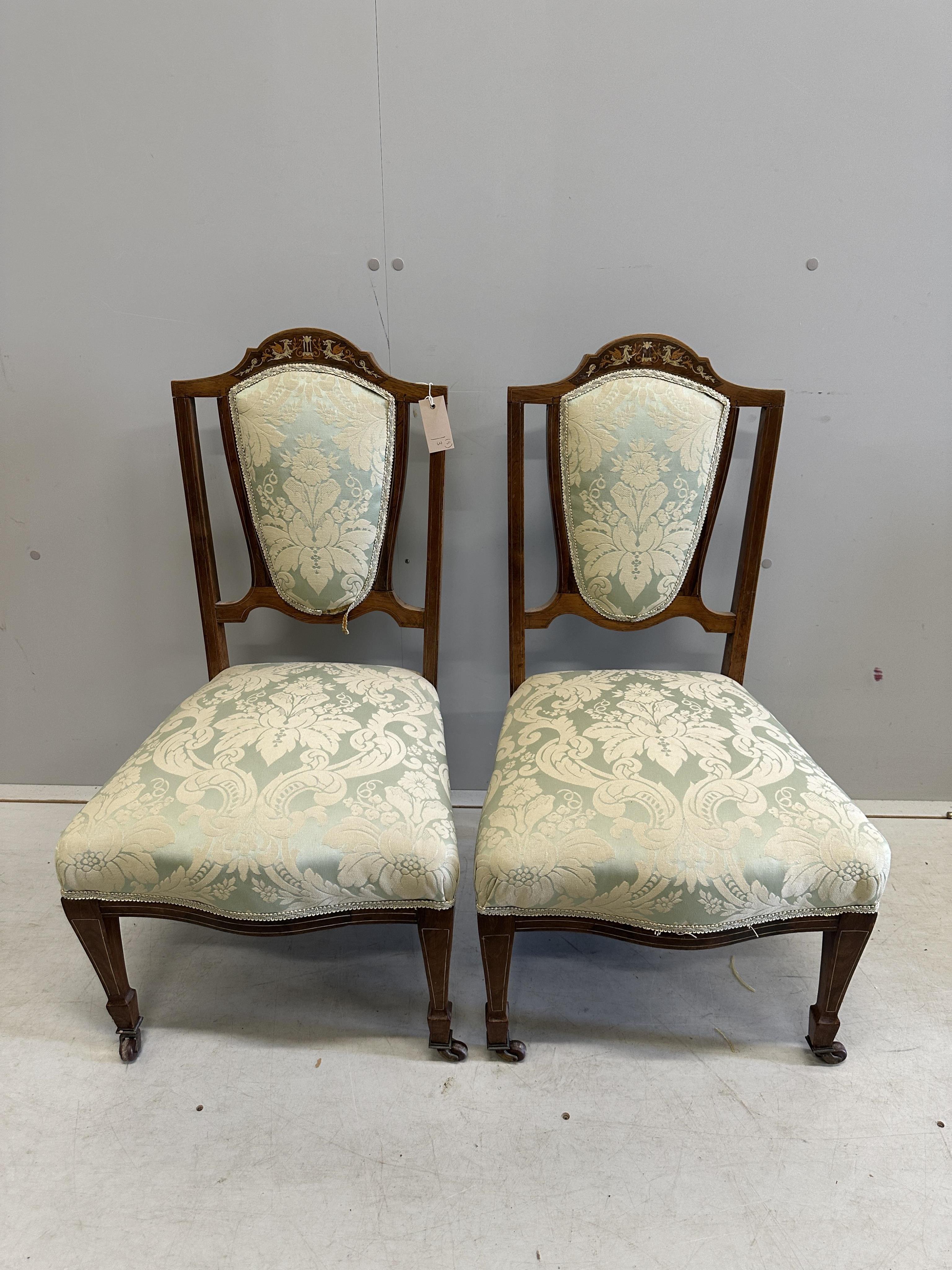 A pair of inlaid Edwardian salon chairs, a Victorian nursing chair and two others. Condition - fair